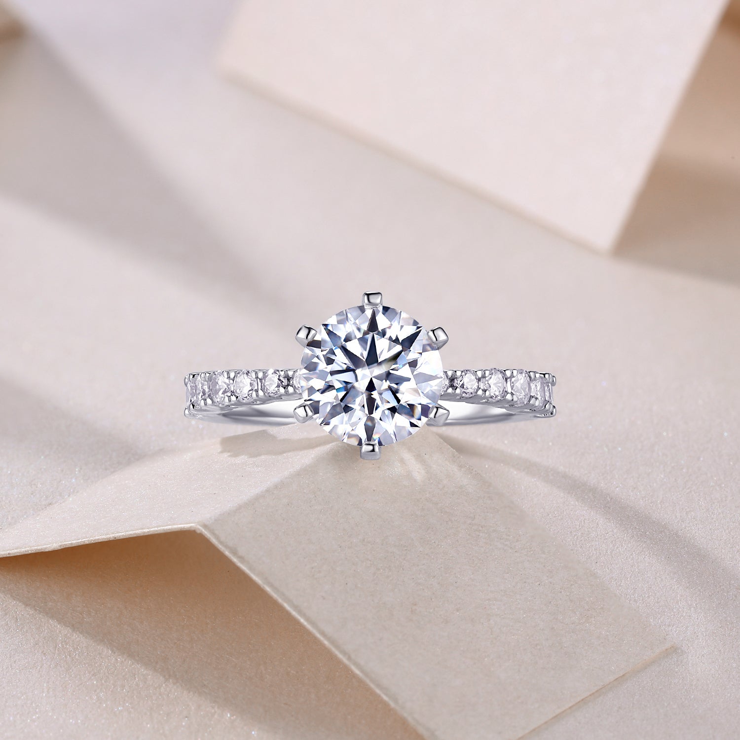 Classic round moissanite pave wedding ring, pavé band and large round center stone