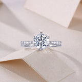 Classic round moissanite pave wedding ring, pavé band and large round center stone