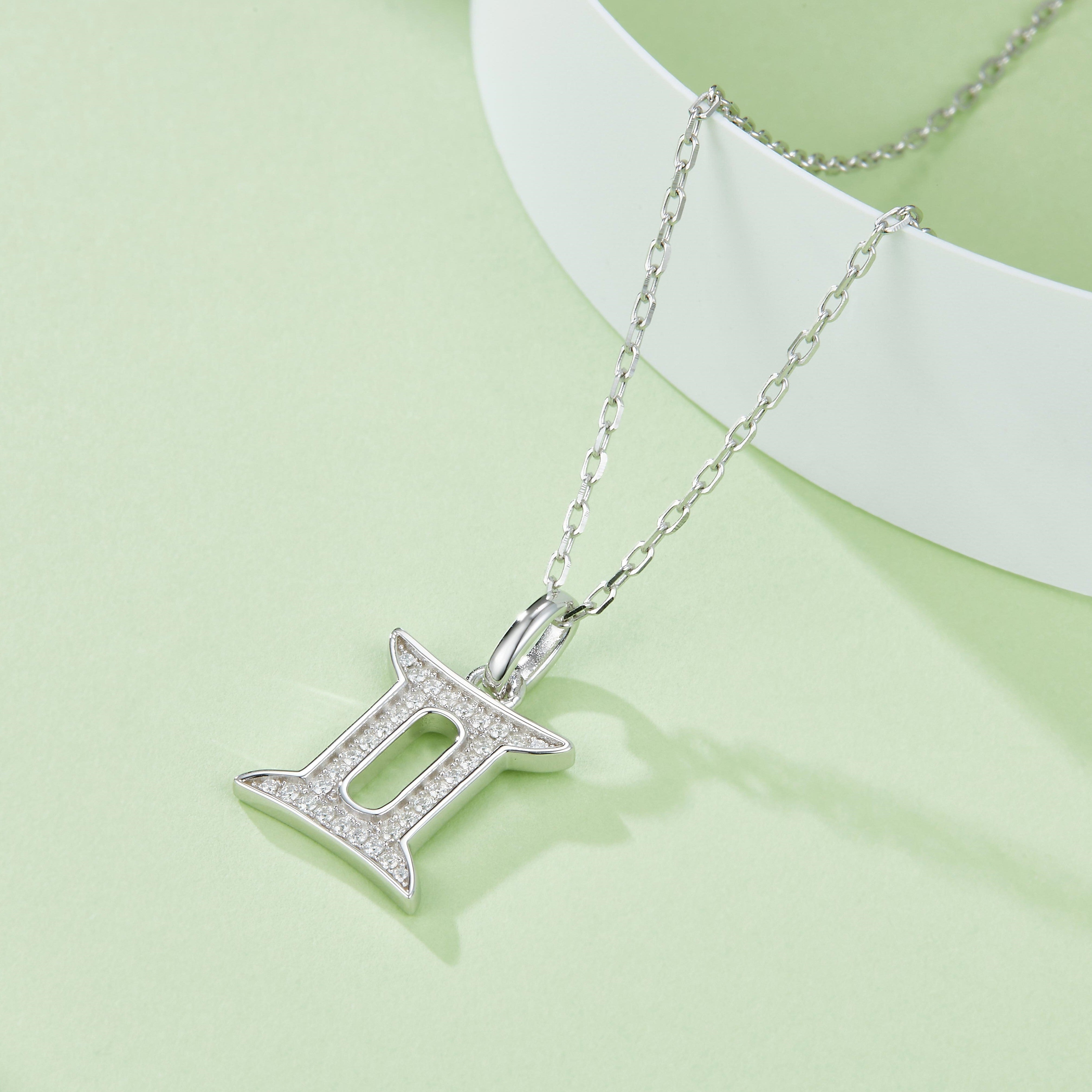 Gemini symbol pendant with pavé stones, white gold vermeil finish, on silver chain