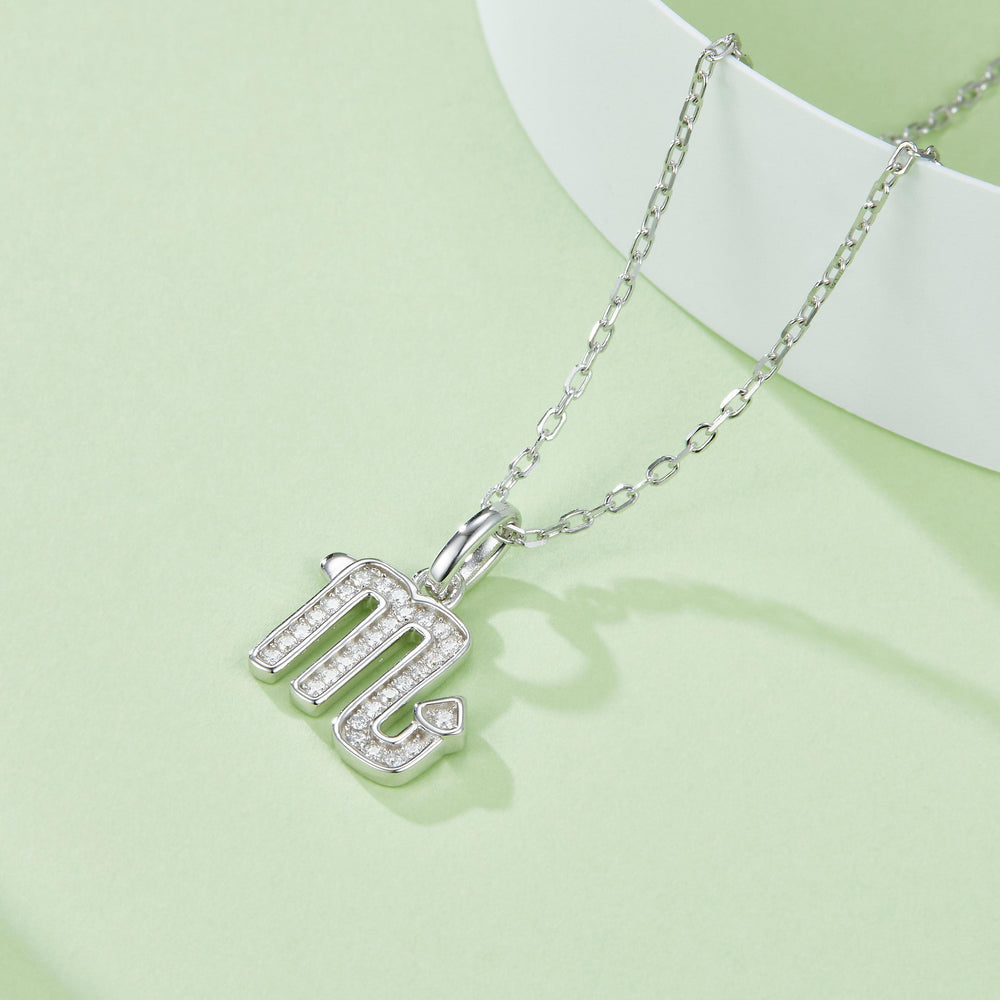 Scorpio glyph pendant on silver-tone chain with pavé-look stones