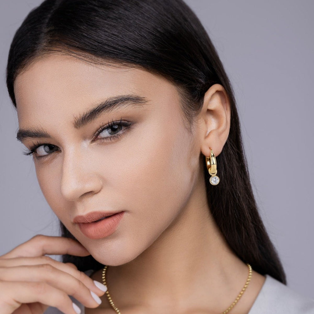 Yellow gold vermeil hoop earrings with round moissanite bezel drop