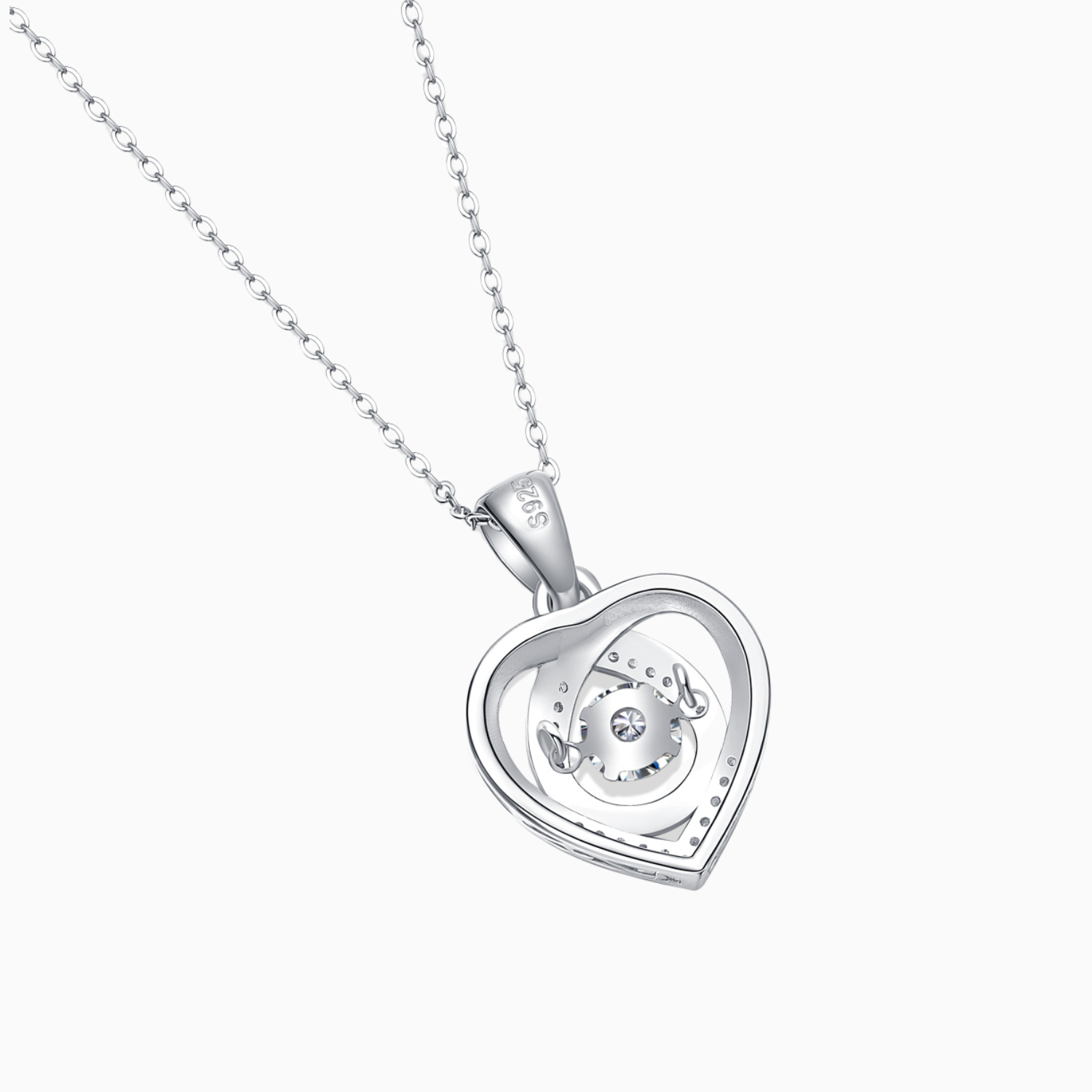 Heart-shaped pendant reverse view with engraved details on chain