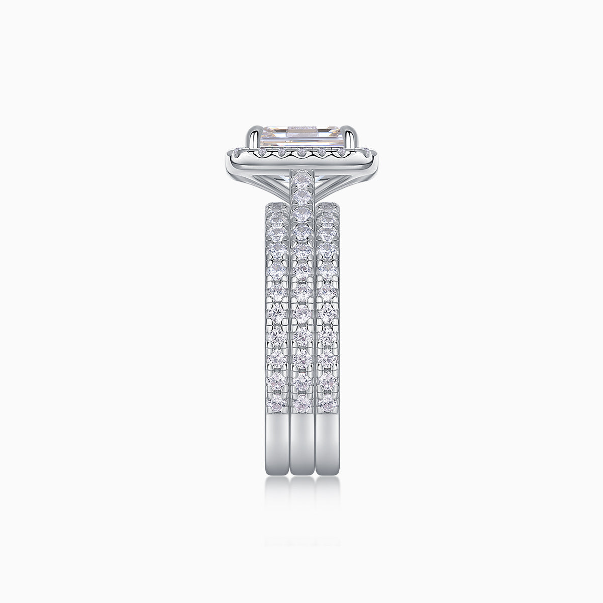Side profile of emerald-cut halo ring set with pavé gallery, white gold vermeil