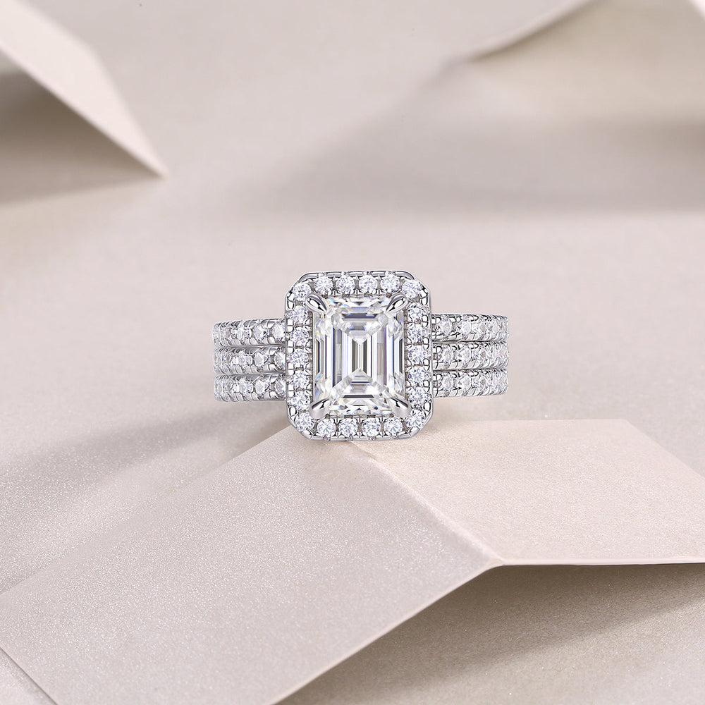 Three-piece emerald-cut halo ring set with pavé side bands, white gold vermeil