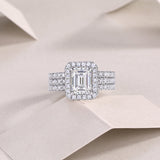 Three-piece emerald-cut halo ring set with pavé side bands, white gold vermeil