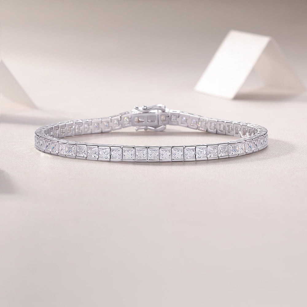 Princess cut moissanite tennis bracelet with box-style clasp and square stone row