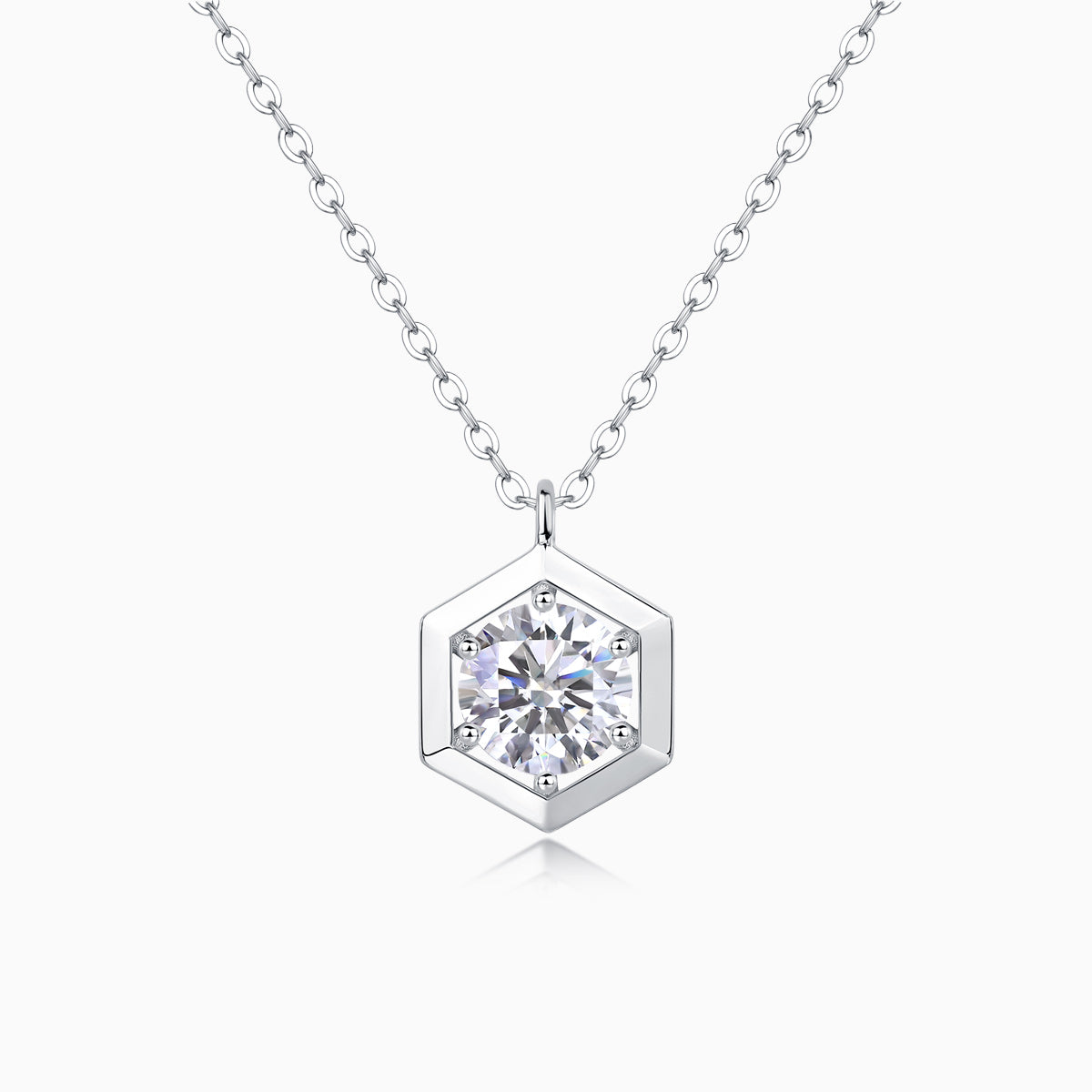 Hexagon frame moissanite pendant, round brilliant in white gold vermeil
