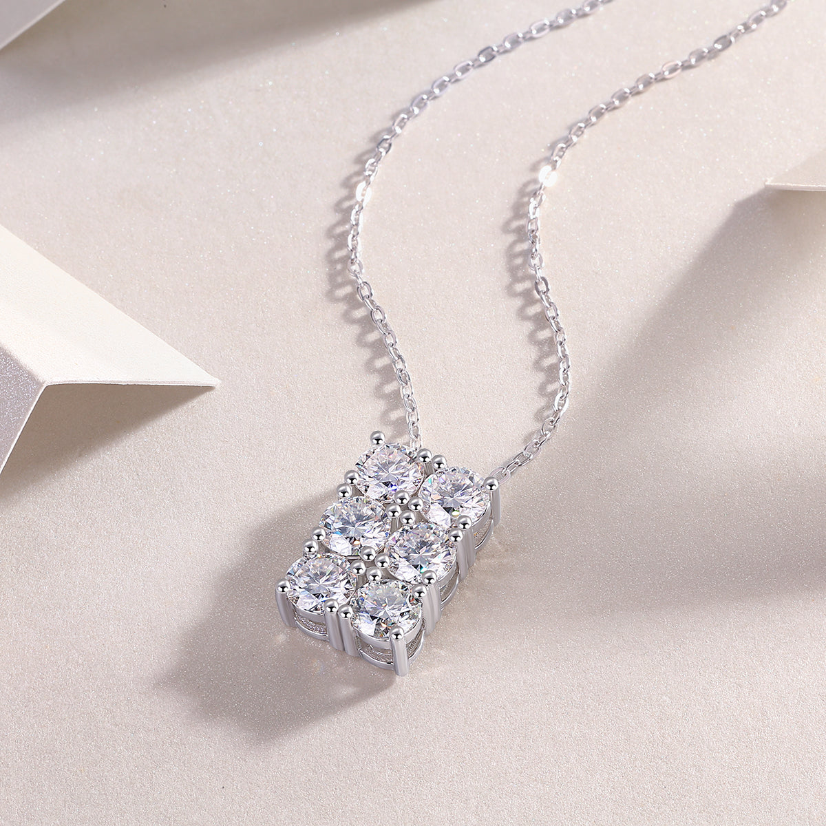 6-stone cluster moissanite pendant with prong-set stones, white gold vermeil chain