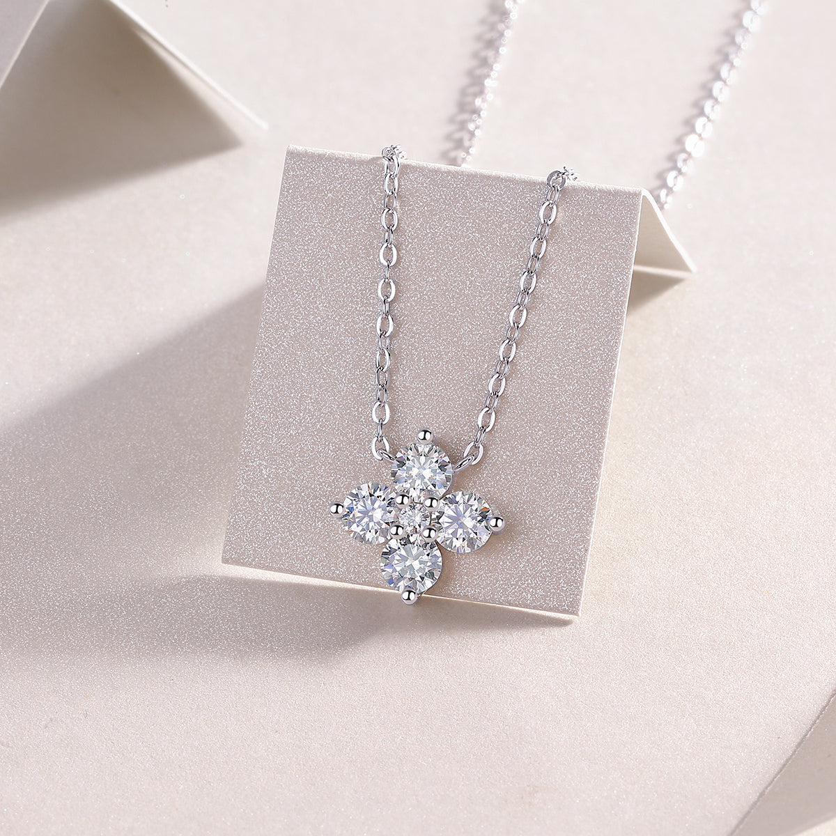 Floral moissanite cluster pendant on link chain, white gold vermeil