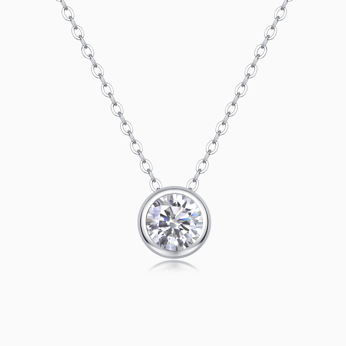 Round bezel-set moissanite solitaire pendant necklace on a silver-tone chain