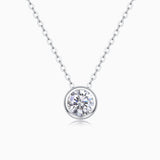 Round bezel-set moissanite solitaire pendant necklace on a silver-tone chain