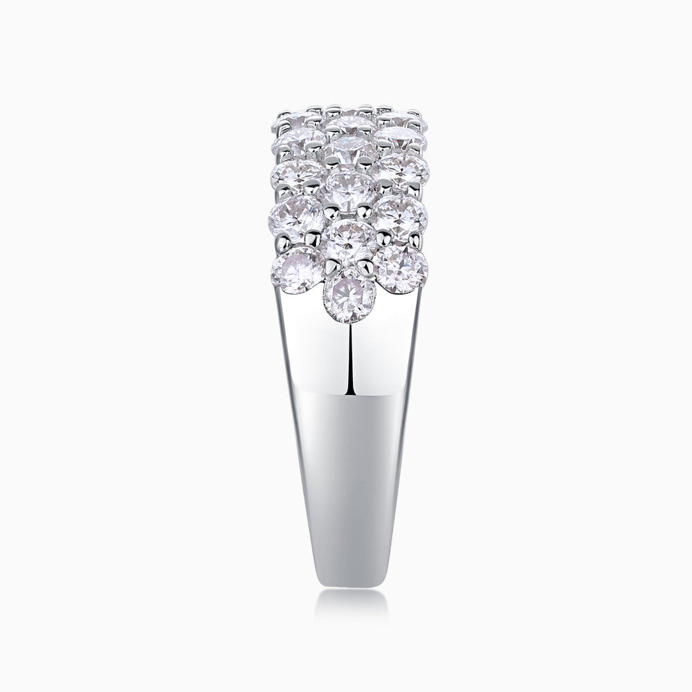 Top view of white gold vermeil moissanite eternity band with prong-set round stones