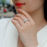 Triple Row Moissanite Eternity Band on hand, round pave stones in three rows