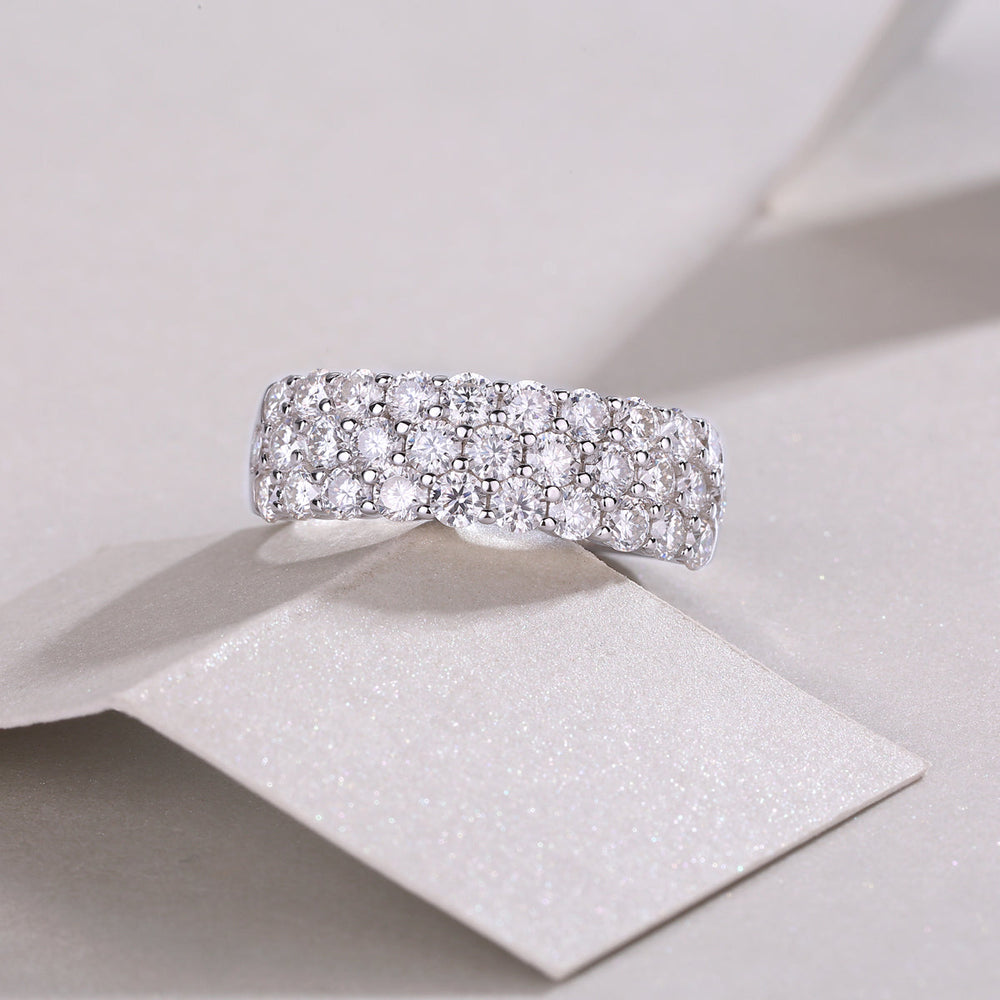 Triple-row moissanite eternity band with prong-set round stones, white gold