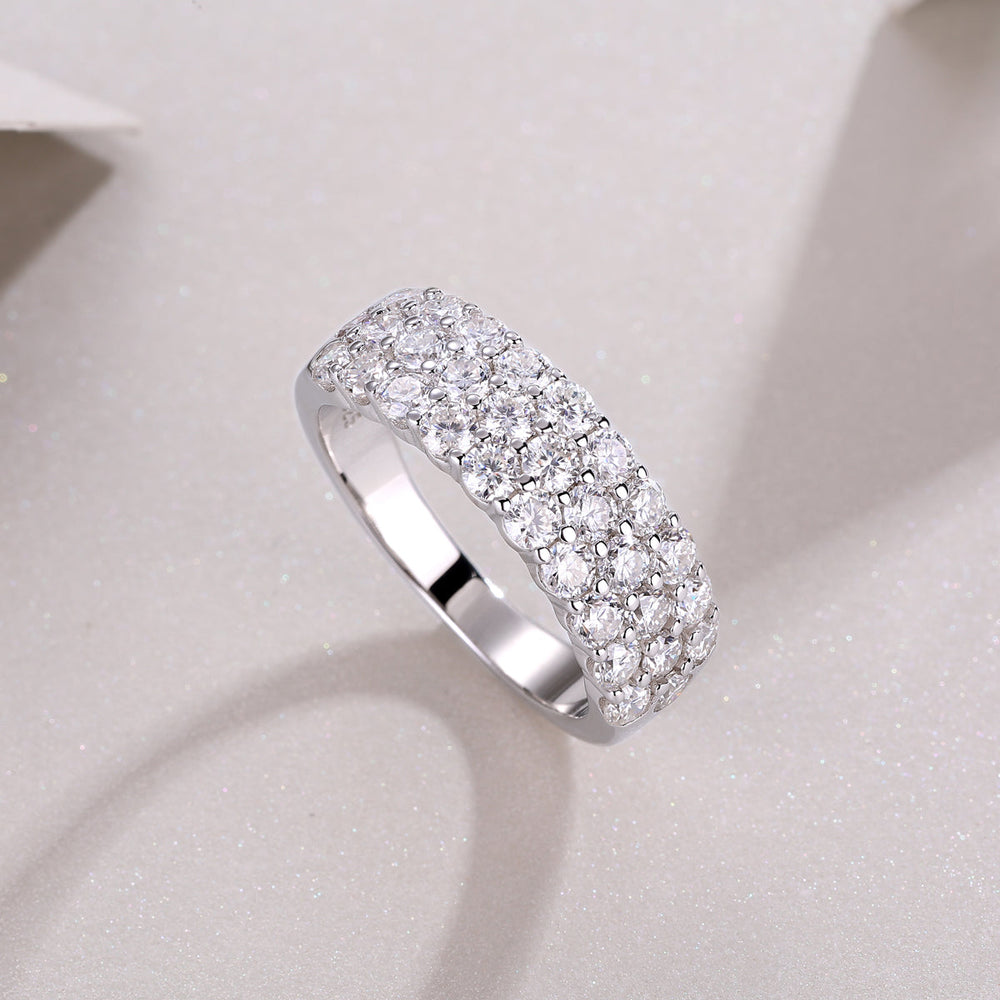 Side view of white gold vermeil eternity band with continuous round moissanite stones