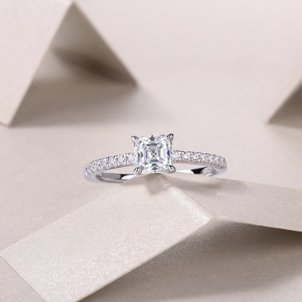 Asscher-cut moissanite ring with pavé band and square center stone
