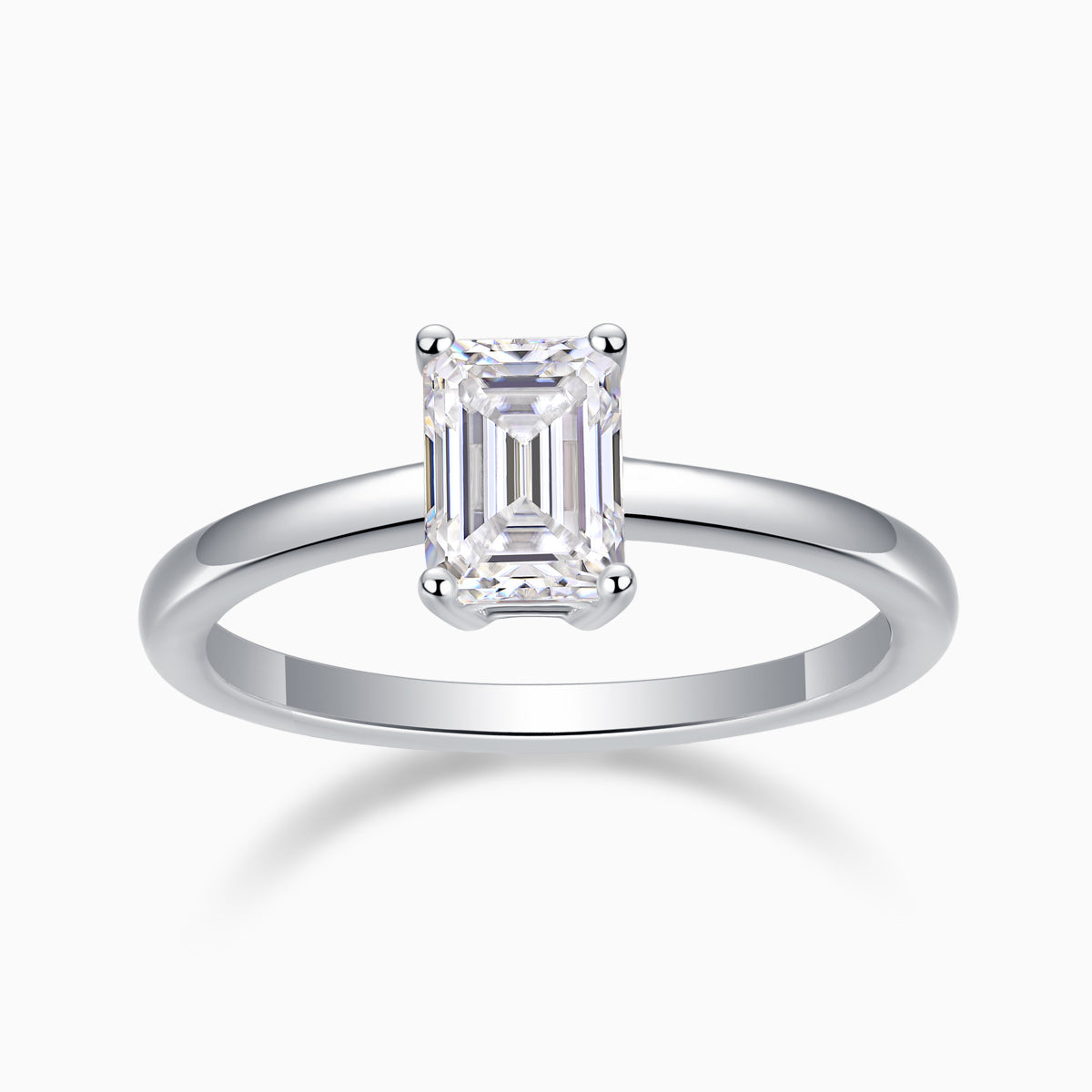 Solitaire emerald-cut moissanite ring with four-prong setting, white gold vermeil