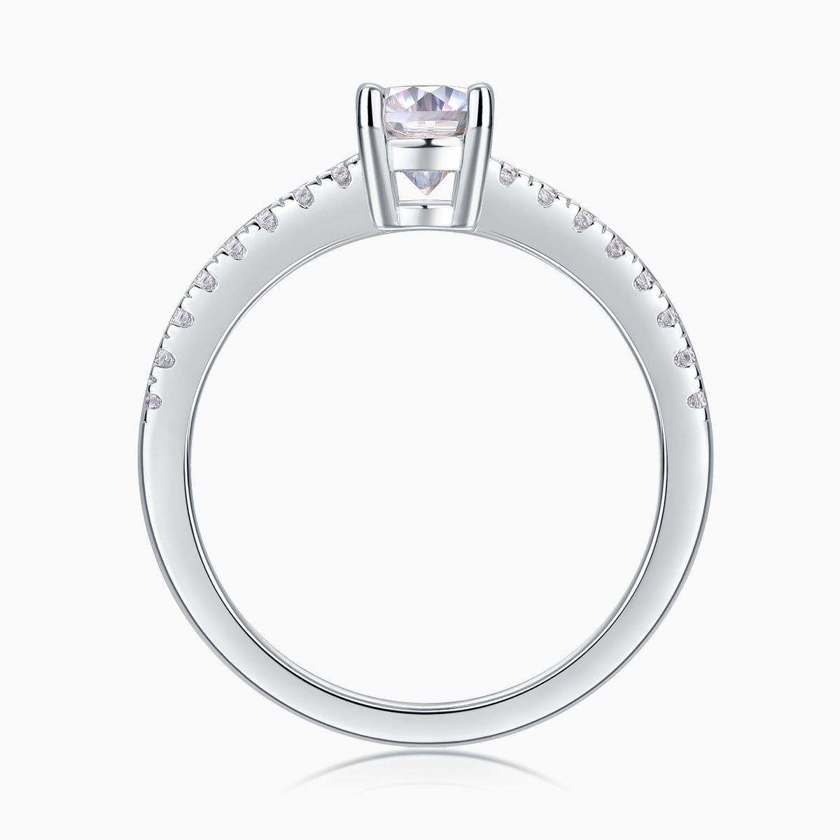 Top view of oval-cut moissanite engagement ring, pavé stones around the upper band
