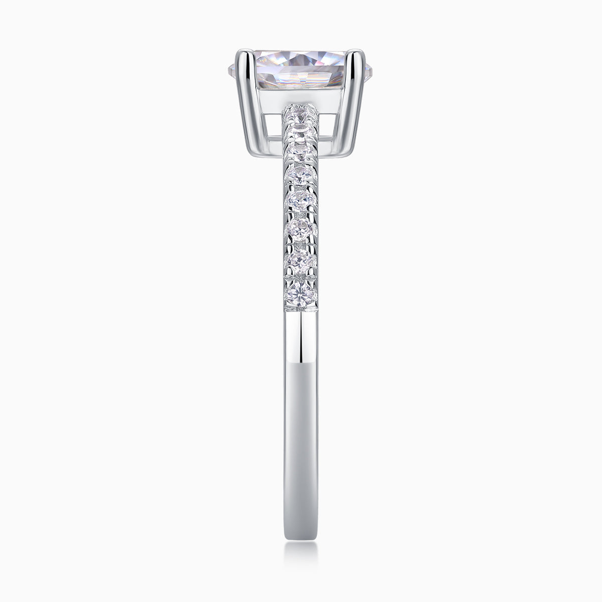Side view of oval-cut moissanite ring with pavé band and halo-like prong basket