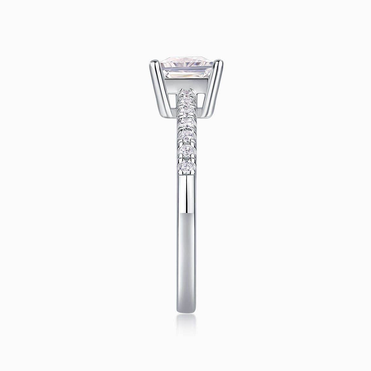 Side view of white-gold vermeil princess-cut pavé ring with prong-set center