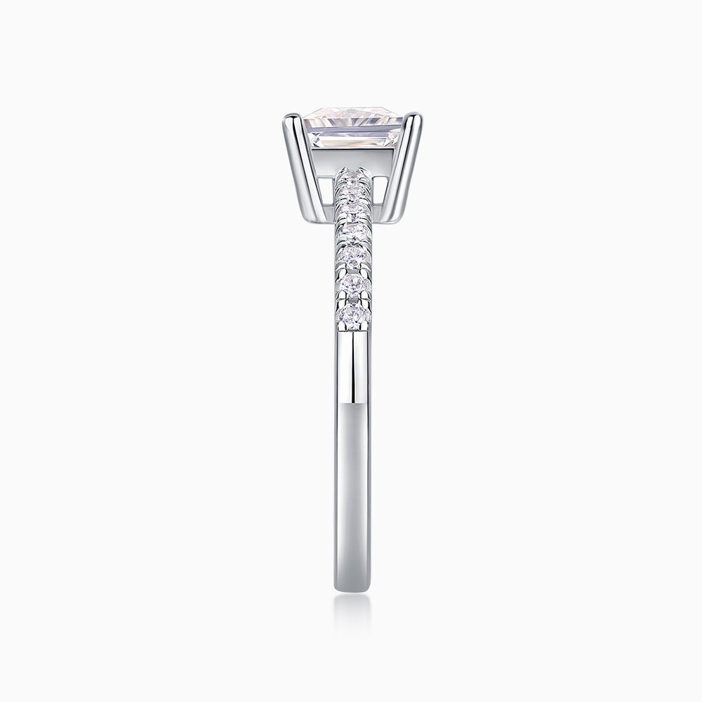 Side view of white-gold vermeil princess-cut pavé ring with prong-set center