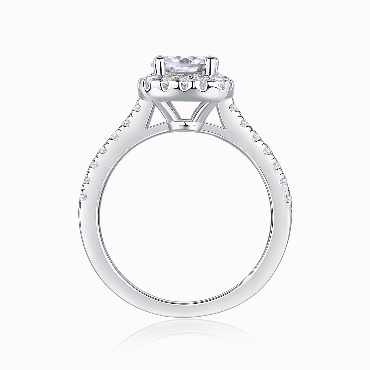 Round halo pavé moissanite ring, side view of center stone setting and prong basket