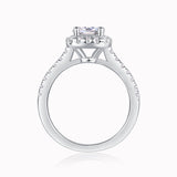 Round halo pavé moissanite ring, side view of center stone setting and prong basket