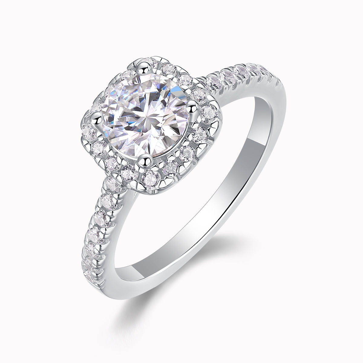 Round halo pavé moissanite ring, close-up side prongs and sparkling pavé details
