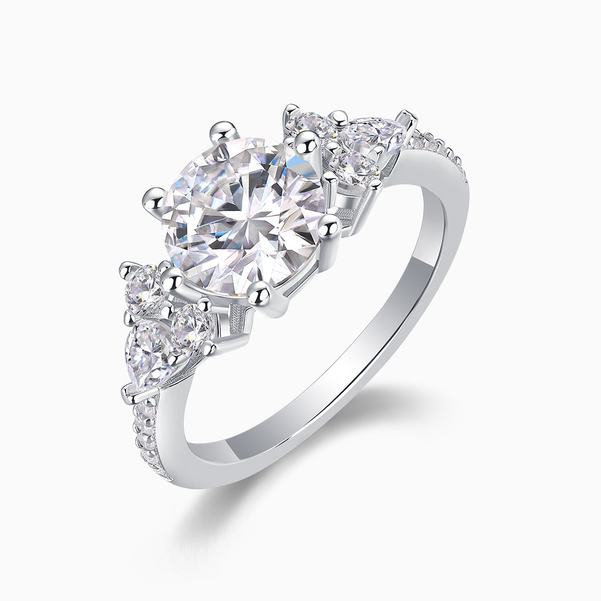 White gold moissanite pavé ring with large round center and two side round stones