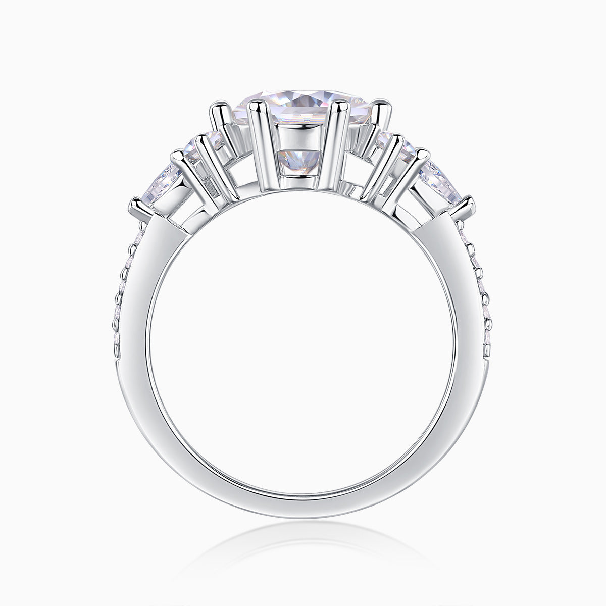 Round moissanite pavé ring top view, white gold setting with prongs and pavé details