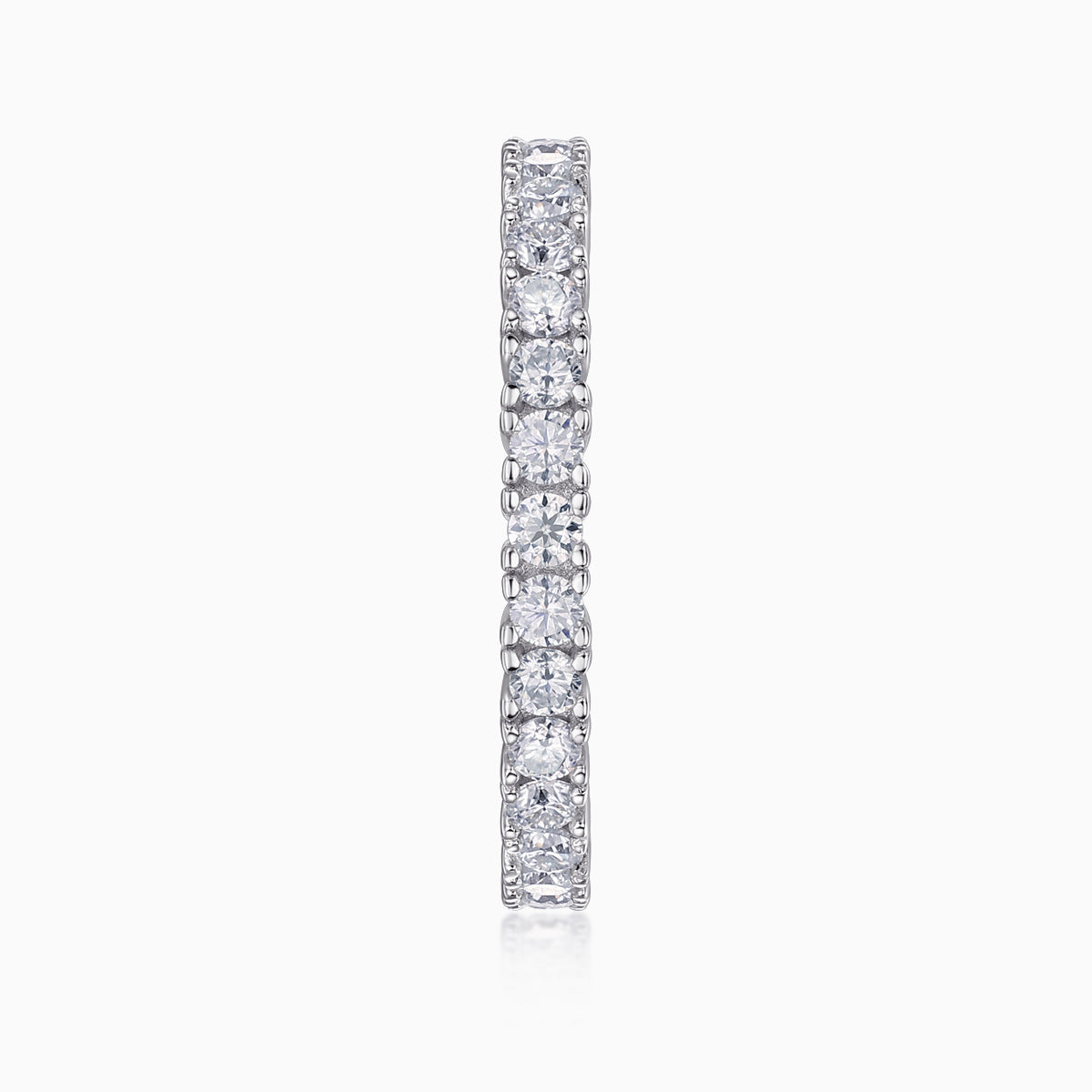 Vertical profile of white moissanite pavé stacking ring with round stones on top