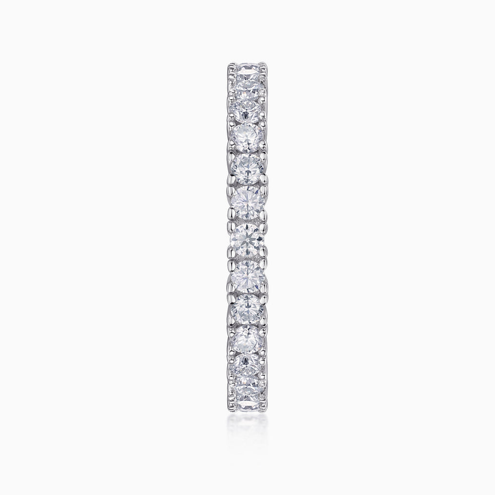 Vertical profile of white moissanite pavé stacking ring with round stones on top