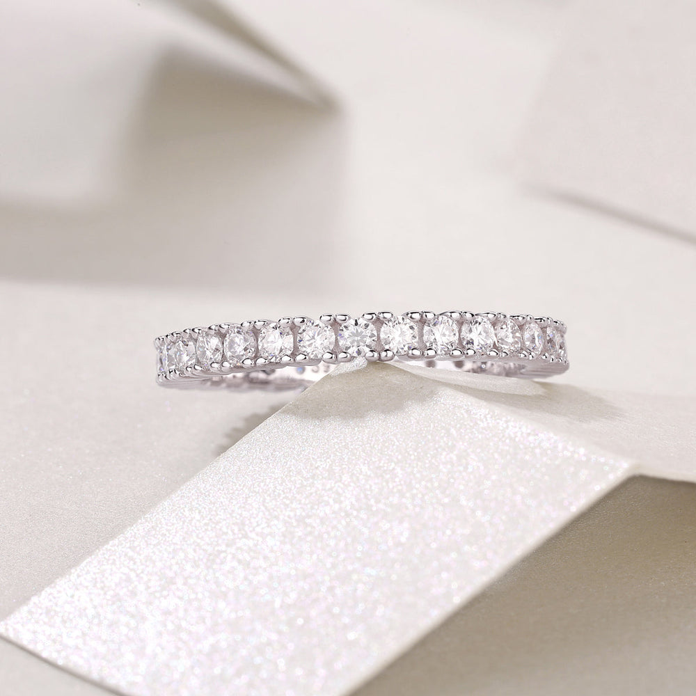 White metal moissanite pavé stacking ring, side profile with evenly spaced round stones