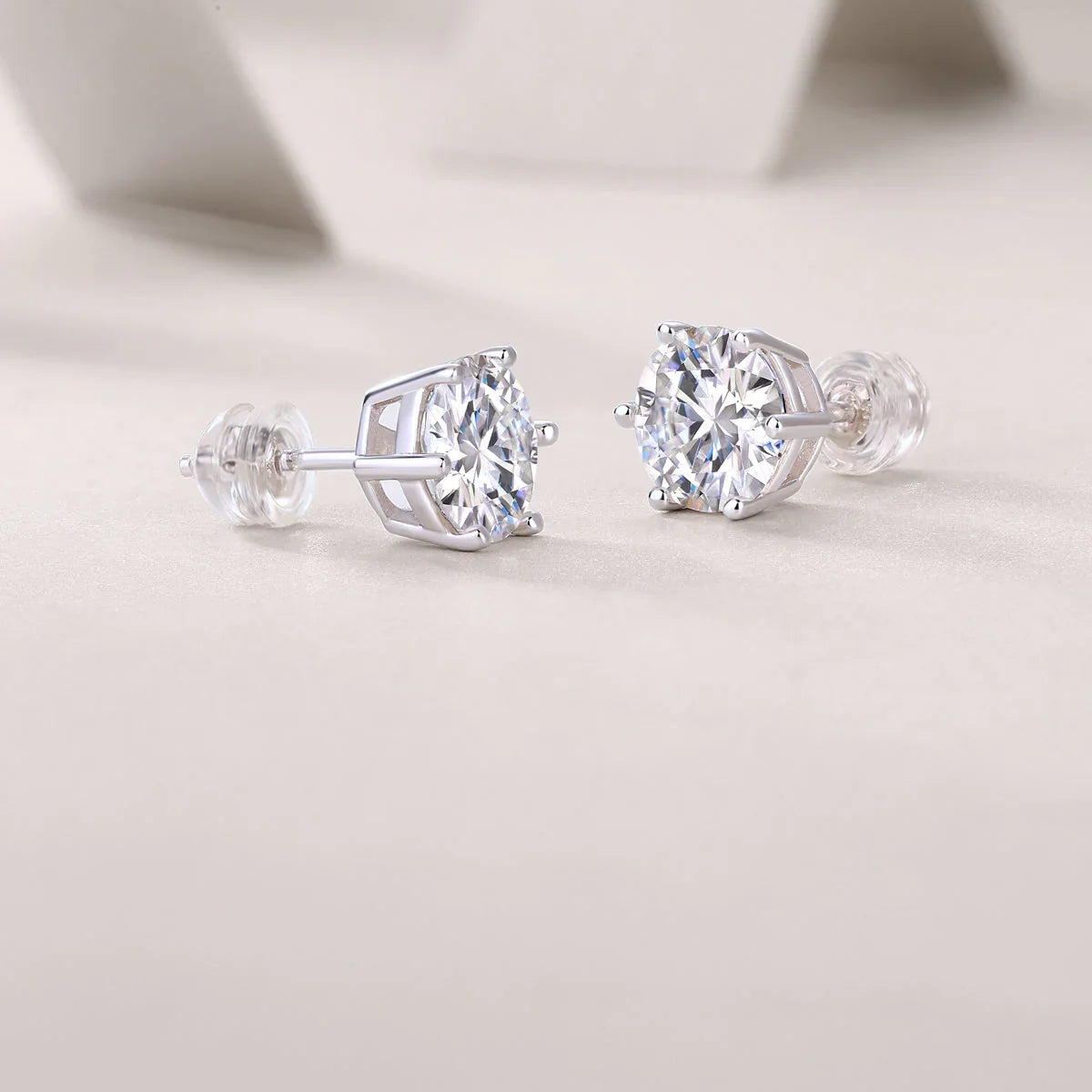 Moissanite solitaire stud earrings side view, round stone in 6-prong setting