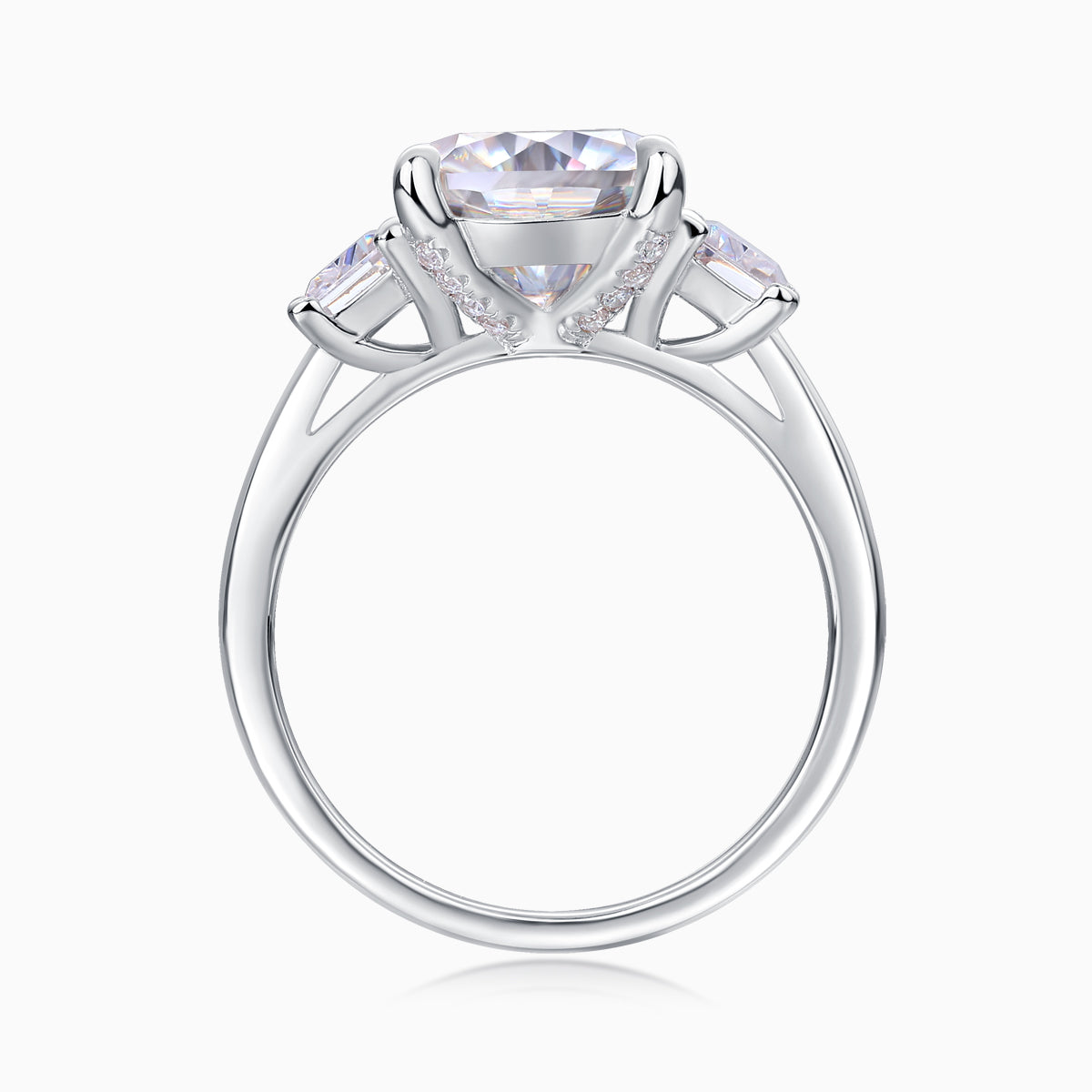 Cushion-cut moissanite ring with V-shaped prongs and small side pavé accents