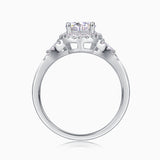 Round halo pavé moissanite ring profile view with prong-set center stone and pavé shoulders