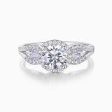 Round halo pavé moissanite engagement ring with center round stone and side emerald-cut accents