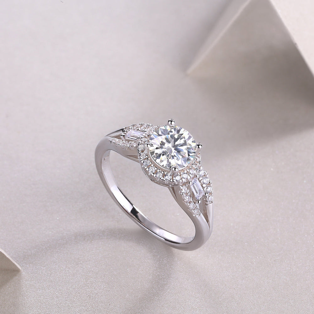 Round halo pavé moissanite ring angled view with center round stone and side pavé stones