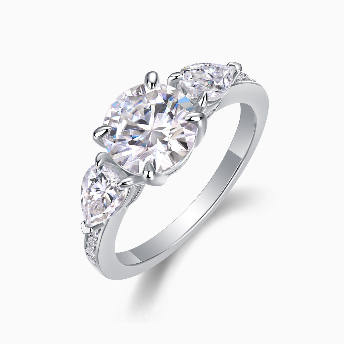 White gold-plated three-stone moissanite ring with round center stone and two side stones