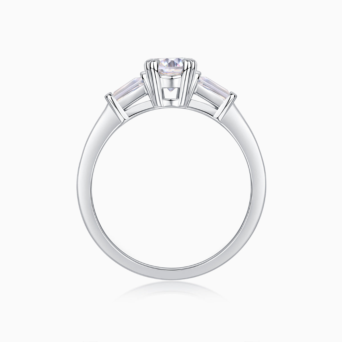 Back view of three-stone ring: oval center with baguette side stones, open band