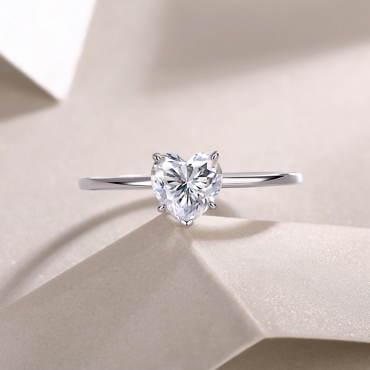 Heart-cut moissanite solitaire ring, front view with heart-shaped center stone