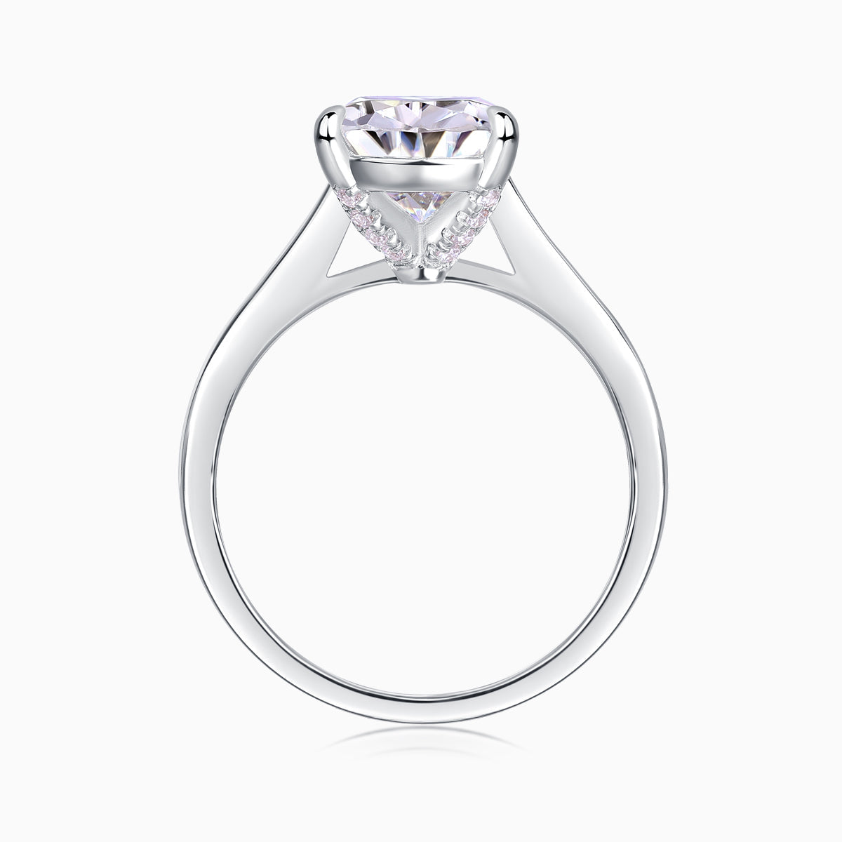 White gold vermeil pear-cut solitaire moissanite ring, angled view of prongs and gallery
