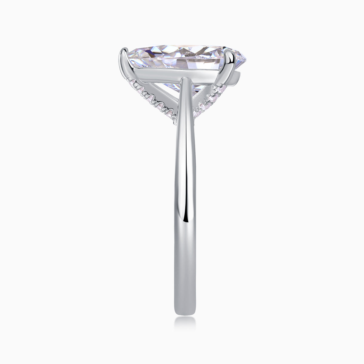 White gold vermeil pear-cut solitaire moissanite ring with side prongs and cathedral setting