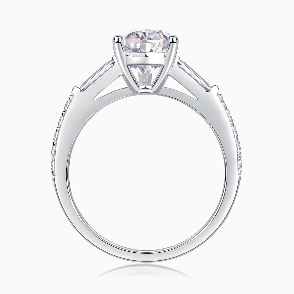 Profile view of pear-cut moissanite setting with baguette shoulders and pavé band