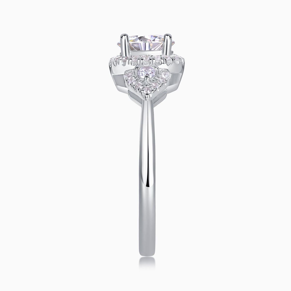 Moissanite halo engagement ring with round center stone, pavé halo, and prongs