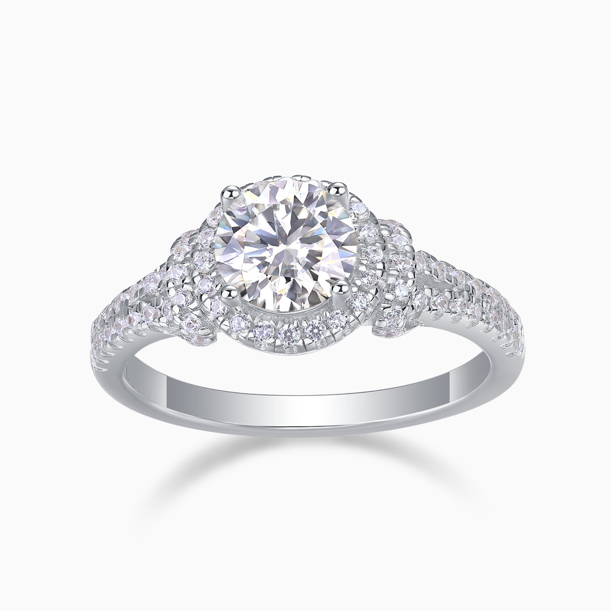 Round halo engagement ring, center moissanite with pavé halo and split-prong details