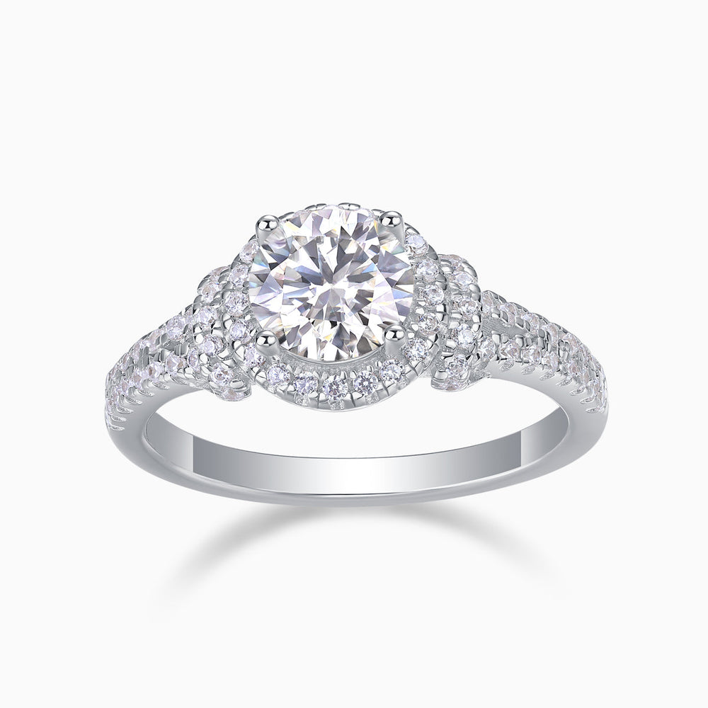 Round halo engagement ring, center moissanite with pavé halo and split-prong details