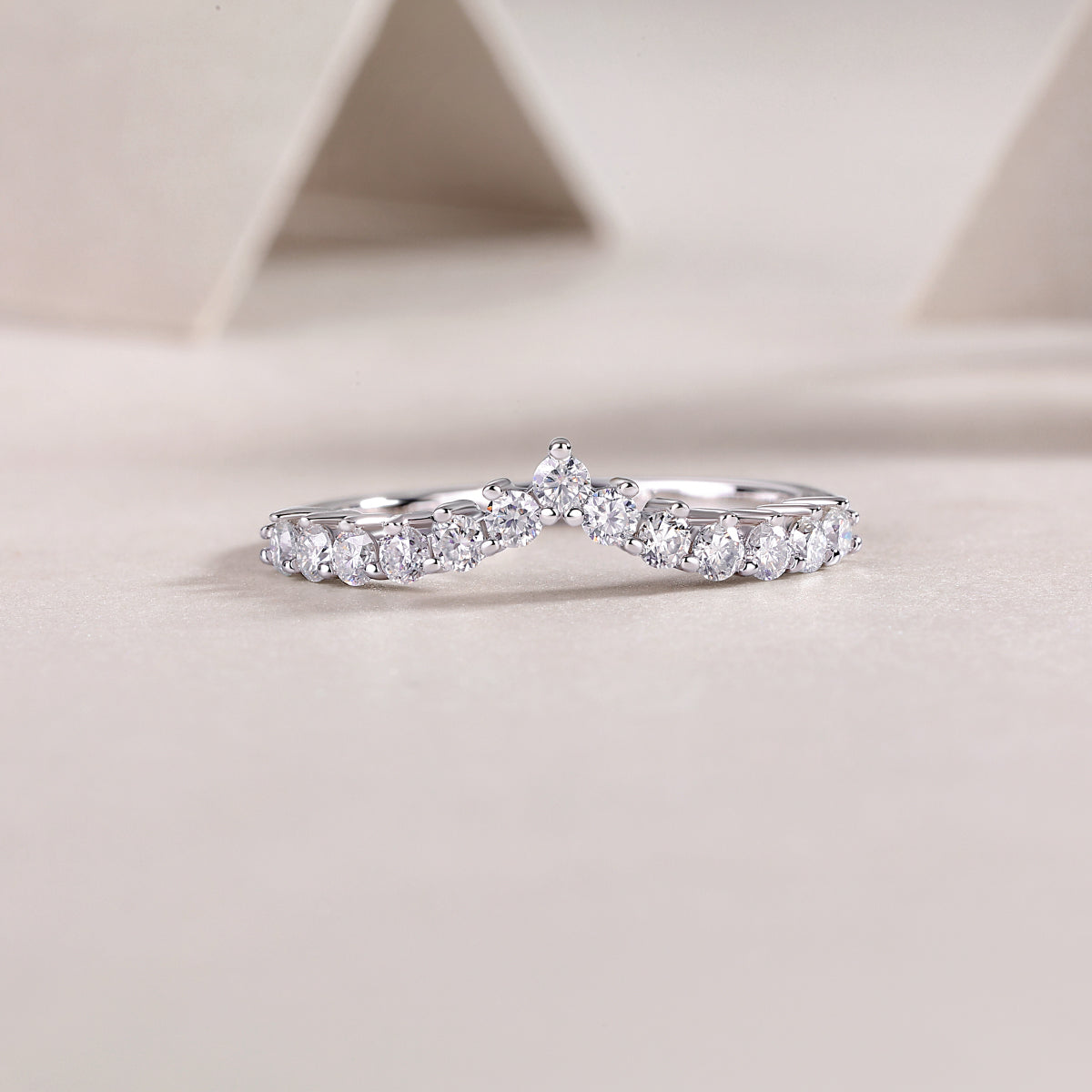 Curved Moissanite Pavé Band worn on hand, white gold vermeil with sparkling round stones