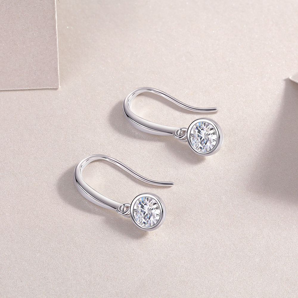 Moissanite solitaire drop earrings, round bezel stones on hook settings