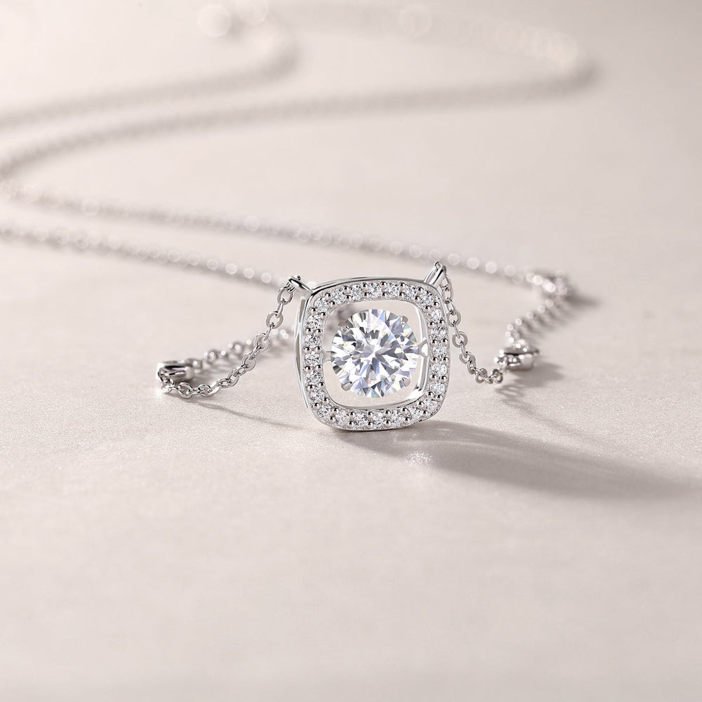 Cushion halo moissanite pendant close-up on station chain, white gold vermeil